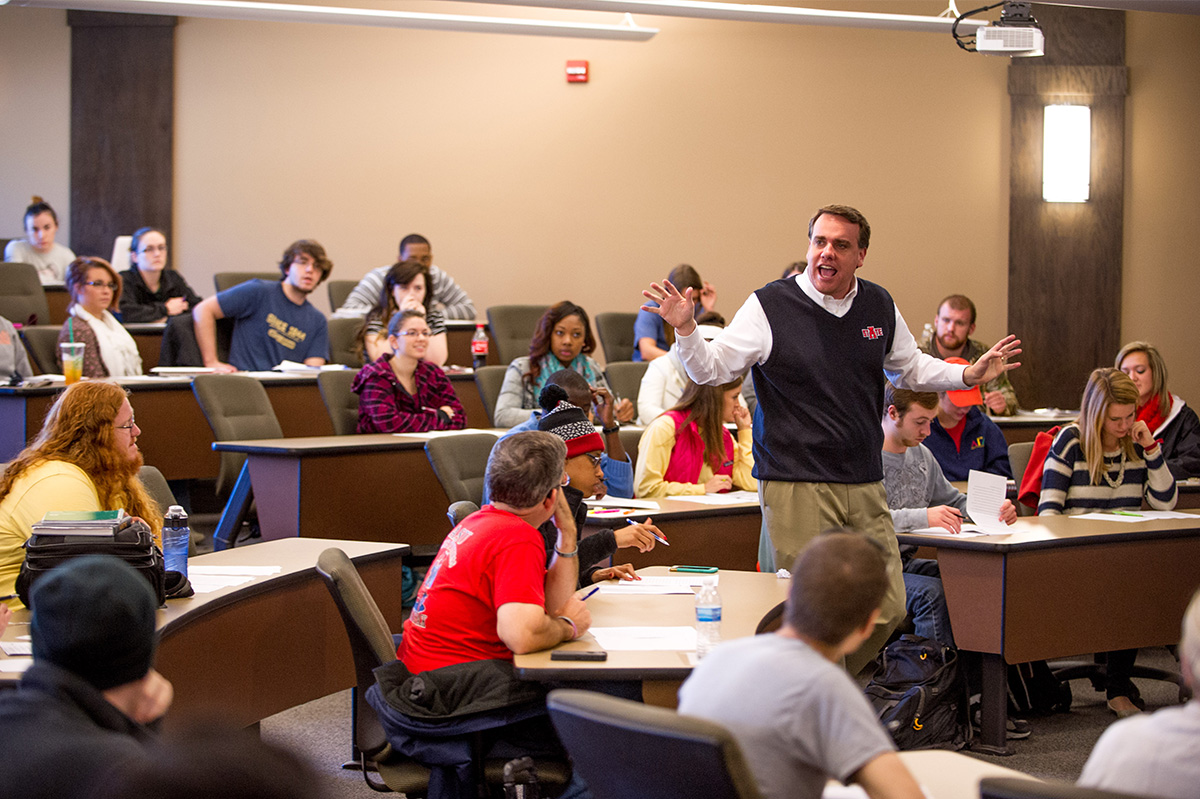 Arkansas State University Professor teaching a lesson in the College of Business.